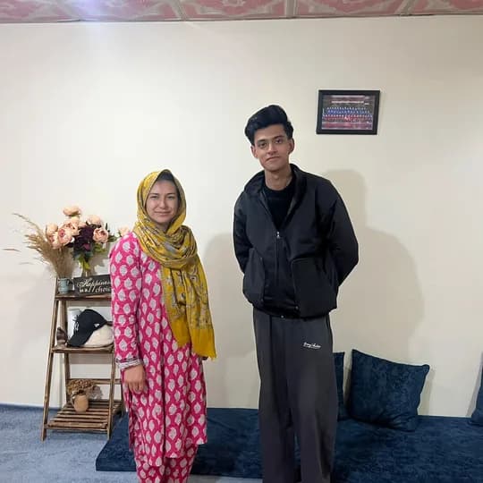 Ali Zaydi photographed with Kaneez Fatima at Balti Cuisine